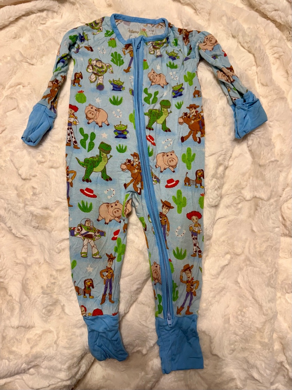 Little Sleepies Light Blue Toy Story Print Footed One-Piece